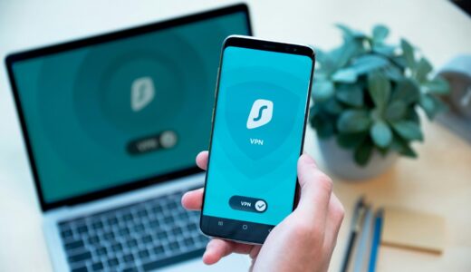 person holding black iphone 4