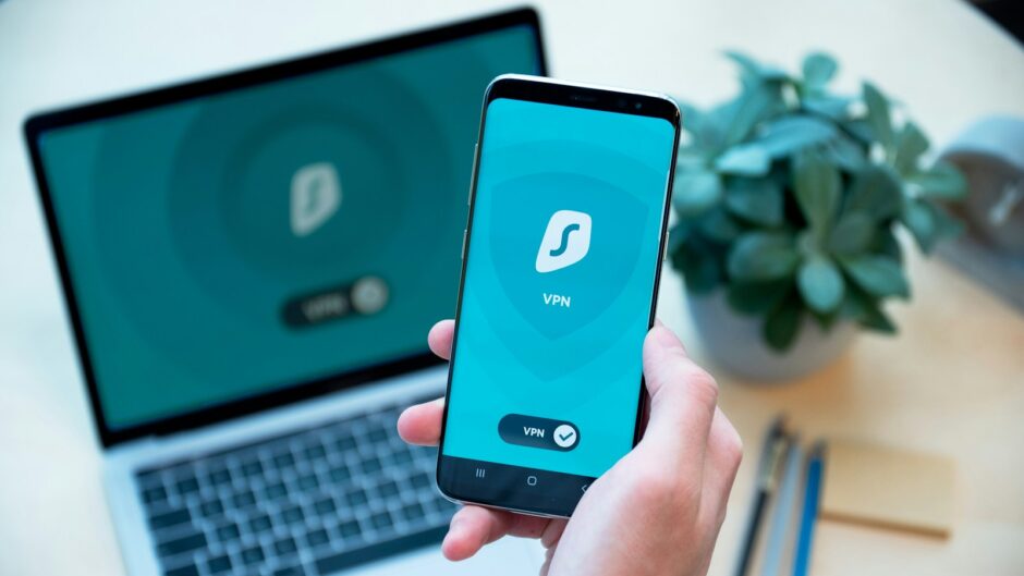 person holding black iphone 4