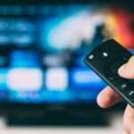 turned-on flat screen television