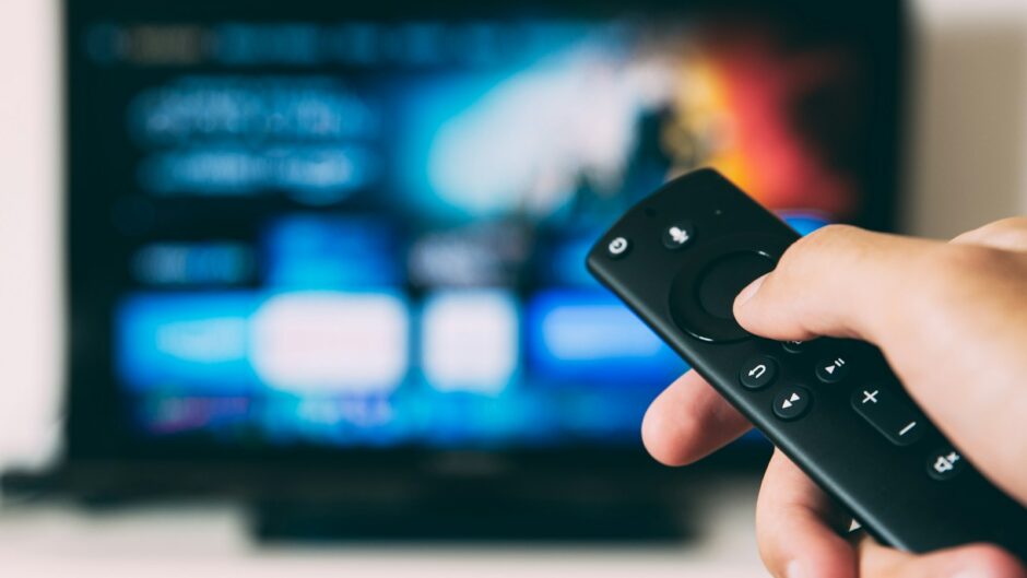 turned-on flat screen television