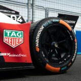 a close up of a racing car on a race track