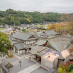 an aerial view of a city with a lot of buildings